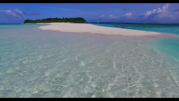 Aerial drone travel of marine coast beach lifestyle by blue lagoon with white sand background of a d alt