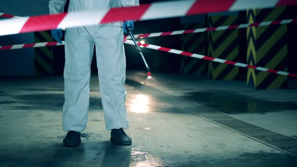 Floor Is Getting Chemically Disinfected By an Expert. Coronavirus, Disinfection Concept alt