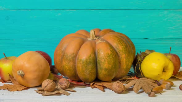 Halloween Still Life with Decorative Pumpkins, Walnuts, Acorns and Autumn Leaves alt