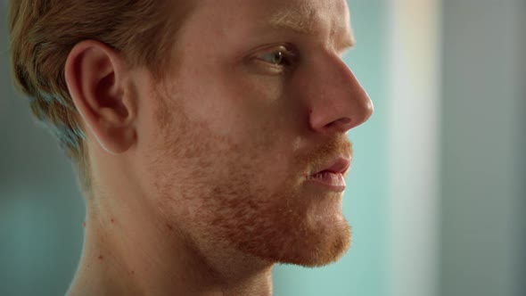 Serious Man Face Expression Closeup alt