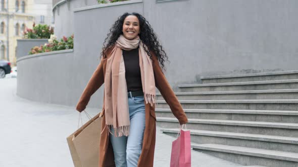 Happy Carefree Brunette Girl Young Woman Shopper Consumer Shopaholic in Stylish Coat Walking City alt