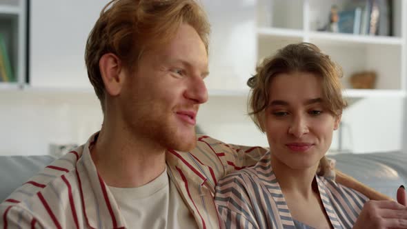 Young Lovers Talking Home in Pajamas Closeup alt