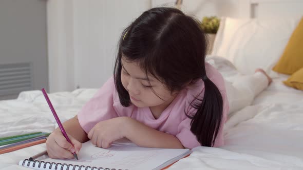 Asia japanese woman child kid relax rest fun happy draw cartoon in sketchbook