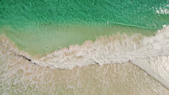 Top Aerial View of Sea Coastline with Sandy Beach