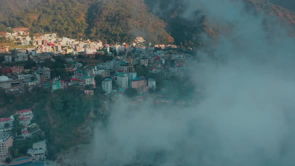 Aerial view of a township in fog, Bihar, india. alt