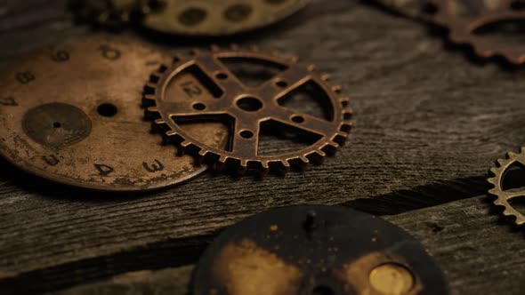 Rotating stock footage shot of antique and weathered watch faces alt