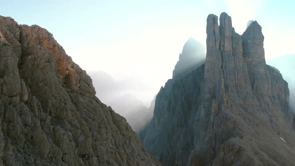 Flying Over Vajolet Towers Mountain in Dolomites Italy at Sunrise