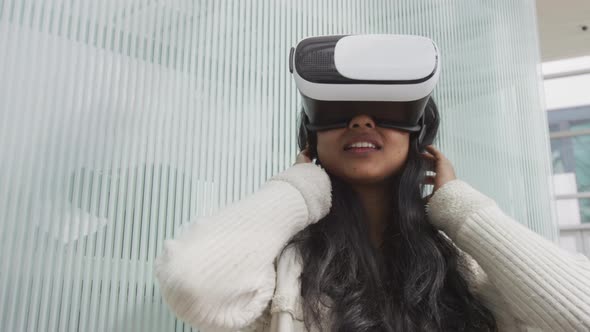 Woman wearing VR goggles