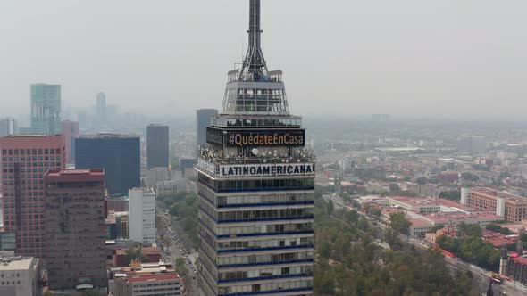 Backwards Reveal of Cityscape Around Torre Latinoamericana Tall Building alt