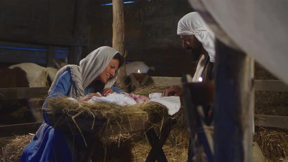 Mary And Joseph with Baby Jesus in Barn alt