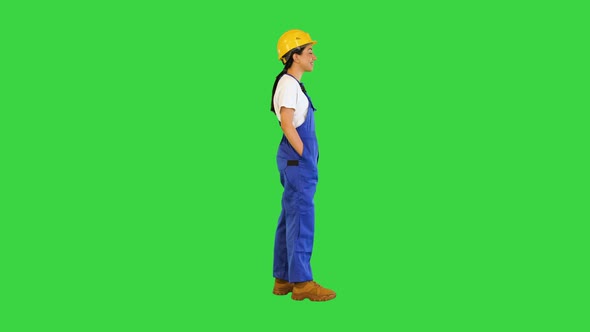 Young Craftswoman Standing and Smiling on a Green Screen Chroma Key