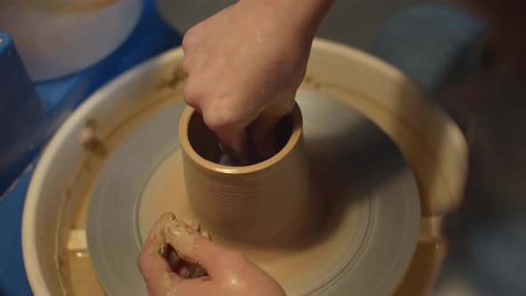Pottery Craftsmanship. Girl Makes a Handmade Vase alt