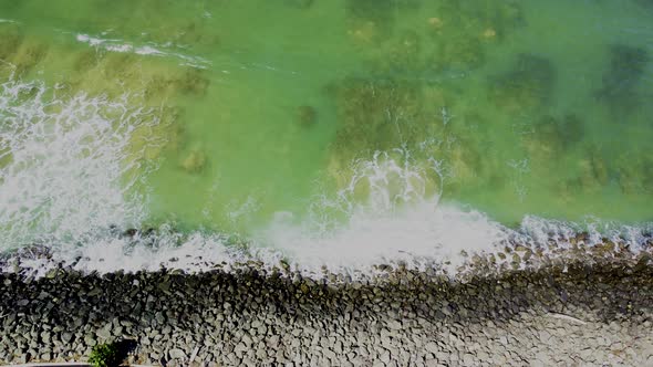 Waves crashing on coast rocks, Puerto Rico Beaches alt