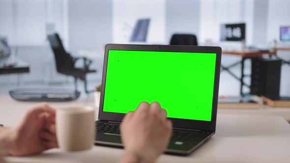 Office Worker with Chroma Key Laptop