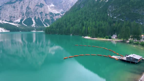 Beautiful Landscape of Braies Lake Lago Di Braies Romantic Place with Wooden Bridge and Boats on the alt
