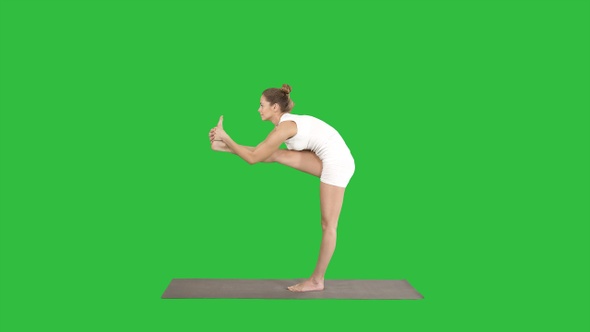 Beautiful young fit woman in sportswear doing sport exercise alt