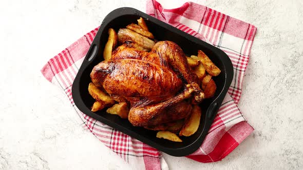 Roasted Chicken or Turkey with Potatoes in Black Steel Mold alt