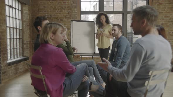 Group in workshop looking at whiteboard