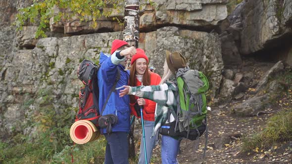 Group of Young People Going at Cave or Mountain Trip