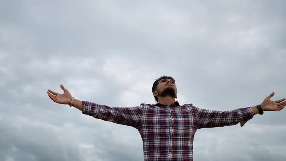 Men stand relax in the rice field. alt
