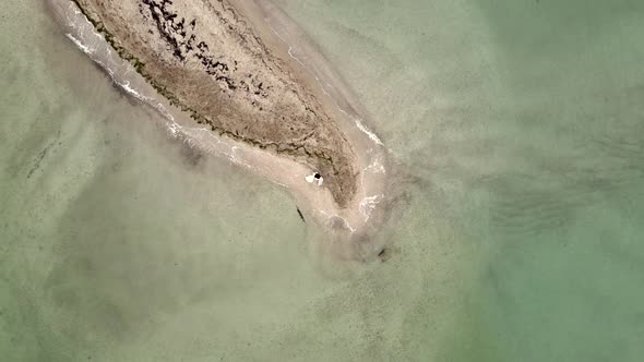 Small Uninhabited Sand Island in Ocean Reef,  Drone High Ungraded Video alt