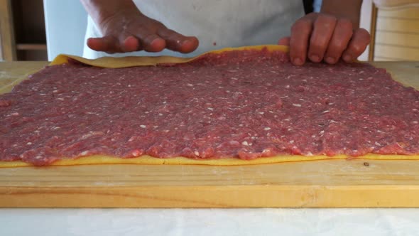Preparing Homemade Pasta with Minced Meat