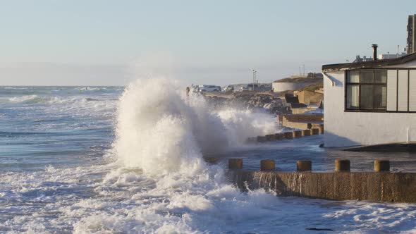 Ocean Wave Floods Into the Storm a House on the Shore alt