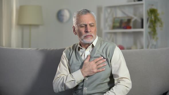 Elder Man Feeling Sharp Pain in Chest and Back, Risk of Heart Attack, Cardiology alt