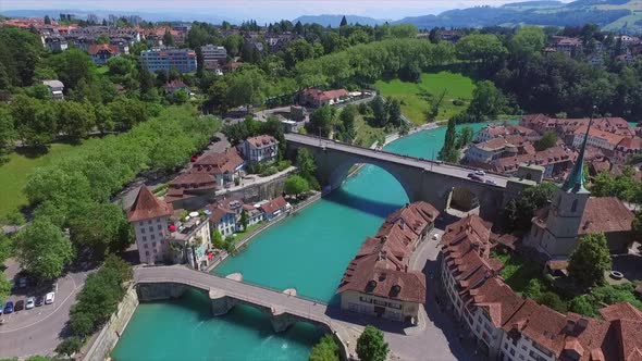 Aerial view with the drone of the ancient city Bern in Switzerland with river alt
