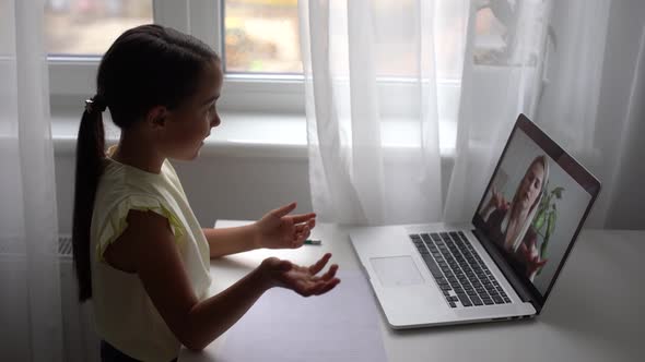 Pretty Primary School Girl Distance Learning at Home alt