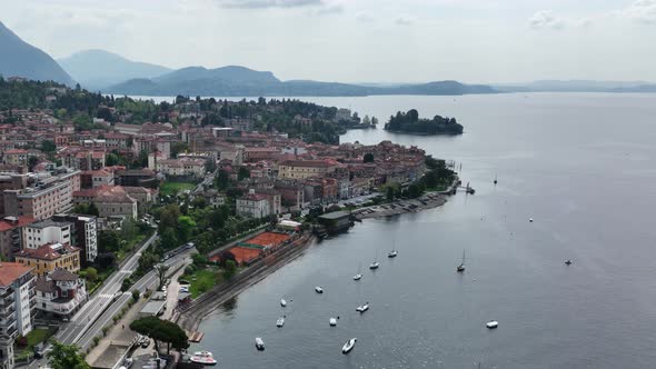 Drone Flying over Beautiful Sail boats in Southern Corner Lake Lago Maggiore alt