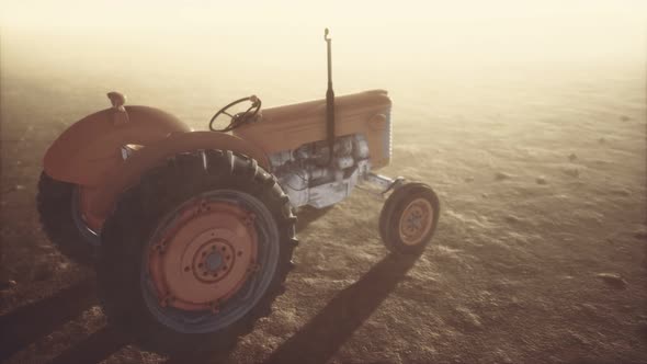Vintage Retro Tractor on a Farm in Desert