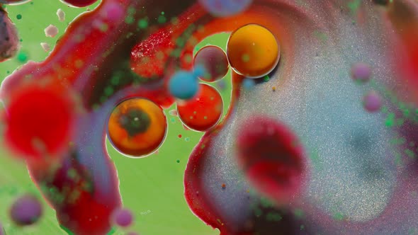 Bubbles Float in Liquid Paint Mixing Ink Oil and Milk Abstract Multicolor Hypnotic Painting alt