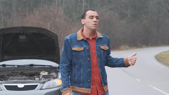 Vehicle Breakdown. Young Man Driver Catching Help for Her Broken Car, Accident at Empty Country Road alt