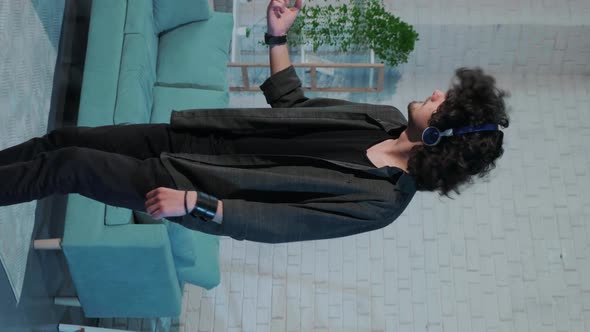 Guy Listening to Music Dancing  Singing and Playing Air Guitar Happy and Crazy alt