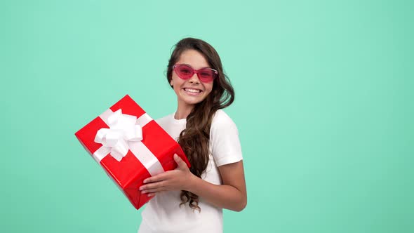 Amazed Child in Sunglasses Hold Present Box for Birthday Happy Birthday