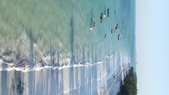 Tanzania Vertical Video  Boat Boats in the Ocean Near the Coast of Zanzibar Aerial View alt