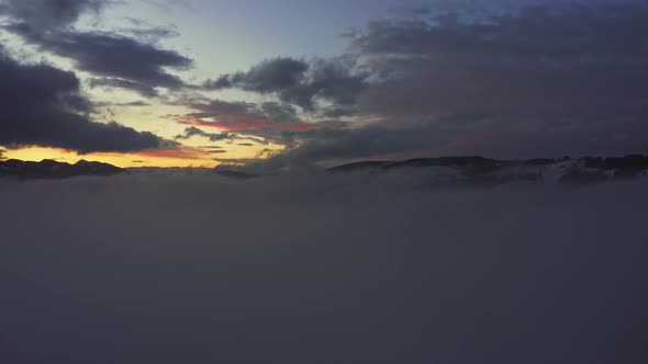 Drone Flying Over Clouds And Fog In Zakopane Near Tatra Mountains At Sunset In Poland. - aerial alt