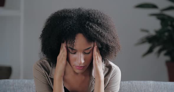 Portrait of Upset Afro Girl Feels Grief, Sadness, Misunderstanding Quarrel, Broken Heart, Sits alt