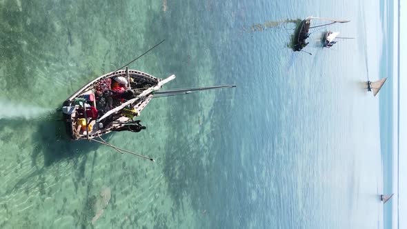 Tanzania Vertical Video  Boat Boats in the Ocean Near the Coast of Zanzibar Aerial View alt
