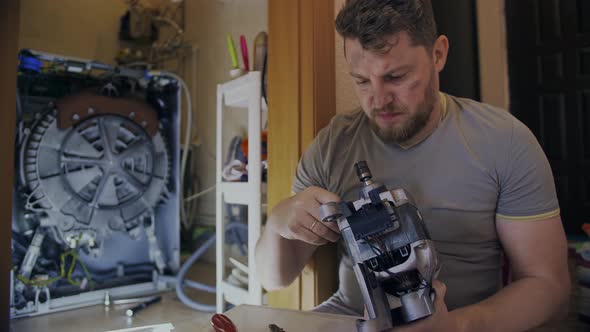 Young Housewife Does Not Know How to Fix His Broken Washing Machine