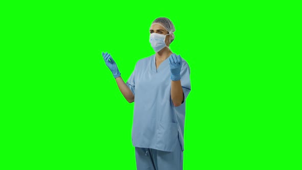 Young surgeon in scrubs alt