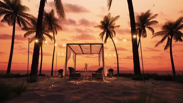 Romantic Dinner On The Beach. Silhouette Of Beach Cafe alt