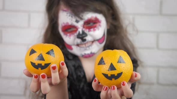A child in a costume for Halloween.  alt