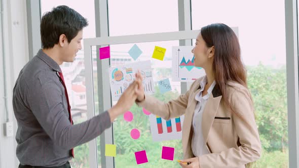 Business People Work on Project Planning Board alt