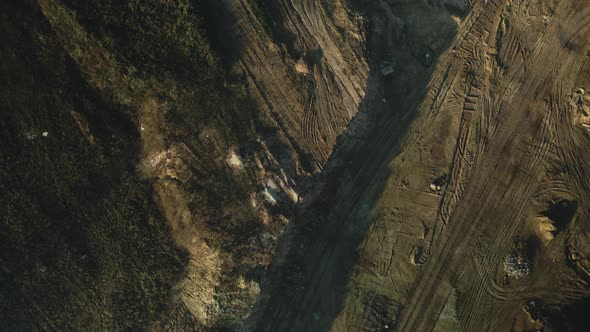 Construction site in a city vacant lot. Photographed in cloudy weather. alt