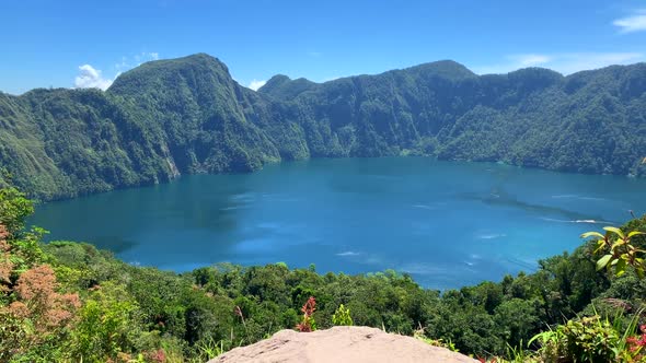 Footage of  Lake Holon in T'boli Sount Cotabato with no people and only water and mountain in the ba alt