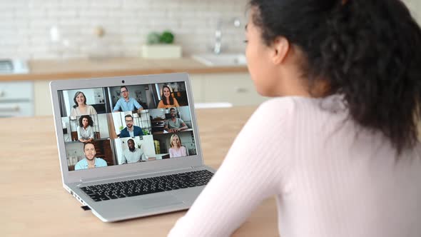 An AfricanAmerican Woman Using a Laptop for Video Meeting alt