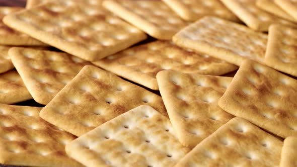 Background of Stacked Salty Cracker Cookies Close Up