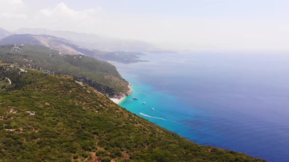 Aerial Drone View of Gjipe Beach and Canyon Dhermi Albania Hidden Paraside with Boats Tourists alt